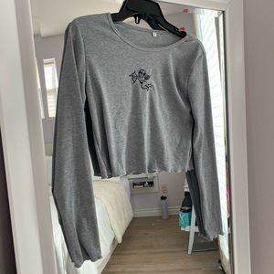Shein long sleeve shirt with angel. Never been worn NWOT. Size small, runs big.